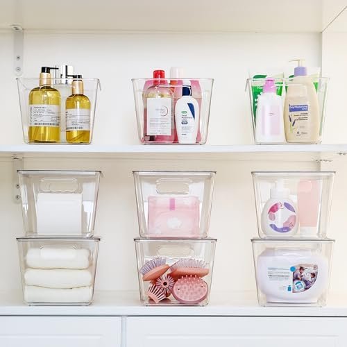 Clear bins with lids for closet and bathroom storage